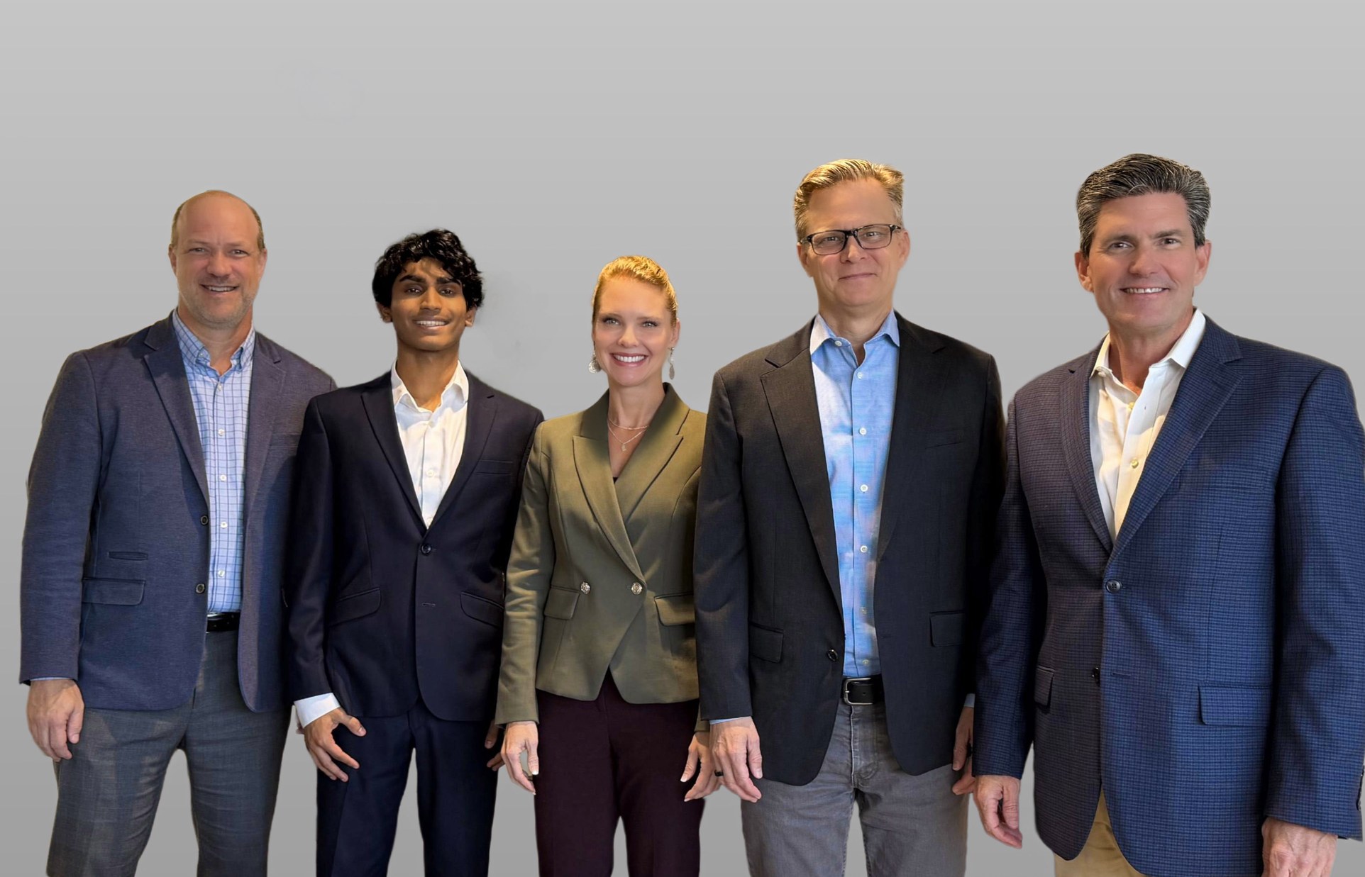 Five members of the RCM team standing together.
